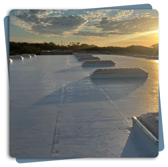WeatherKnight project manager overseeing commercial roofing installation WeatherKnight engineer inspecting flat roof slope and drainage system